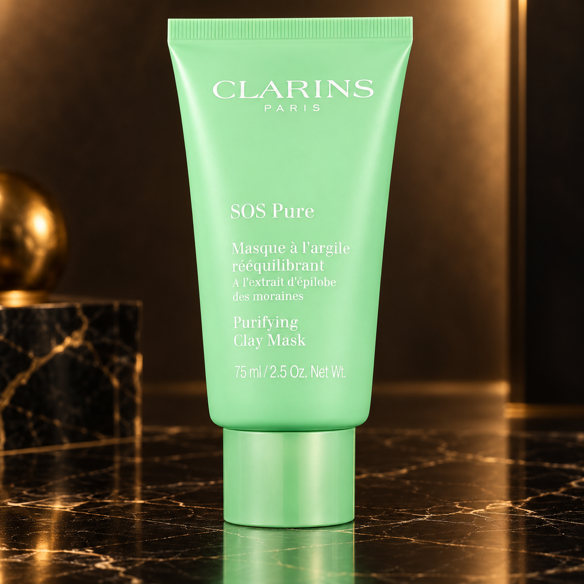 Clarins: SOS — scena su marmo nero