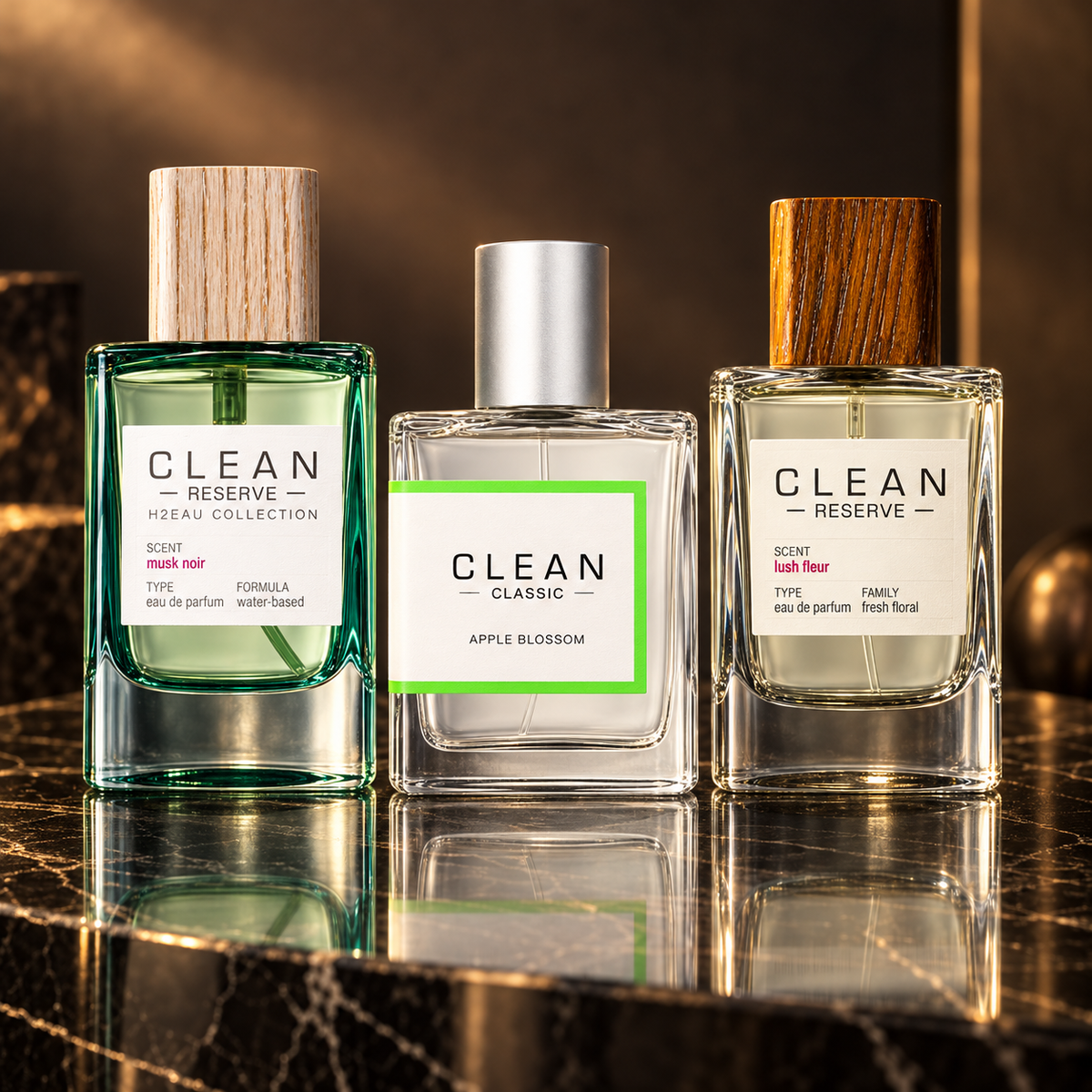 Clean: H2Eau Musk Noir, Classic Apple Blossom, Reserve Lush Fleur — scena su marmo nero