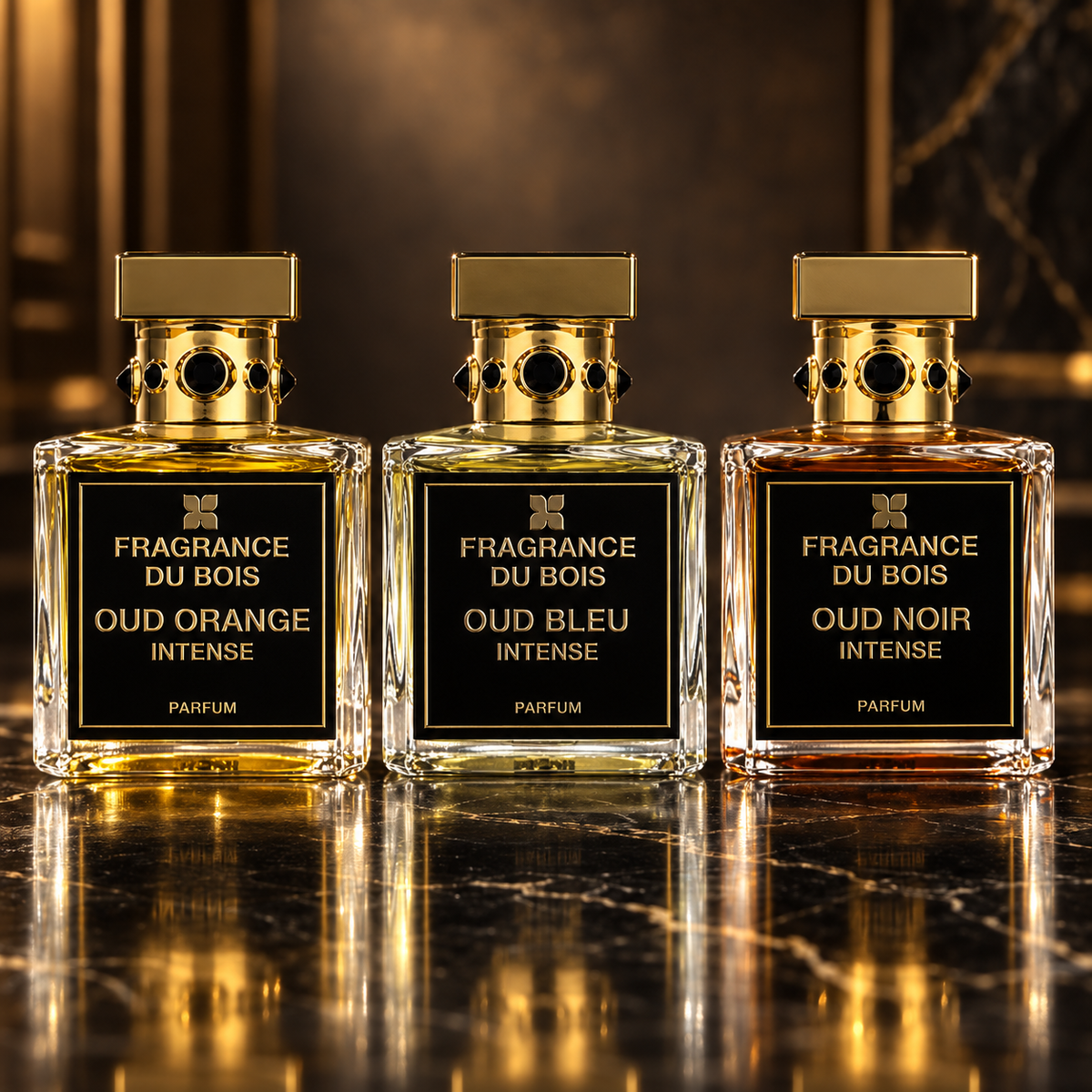 Fragrance Du Bois: Oud Orange Intense, Oud Bleu Intense, Oud Noir Intense — scena su marmo nero